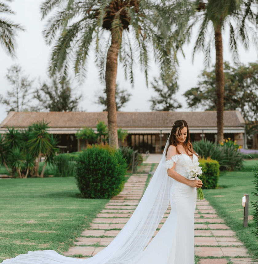 A bride on her wedding day after working with a bride to be coach