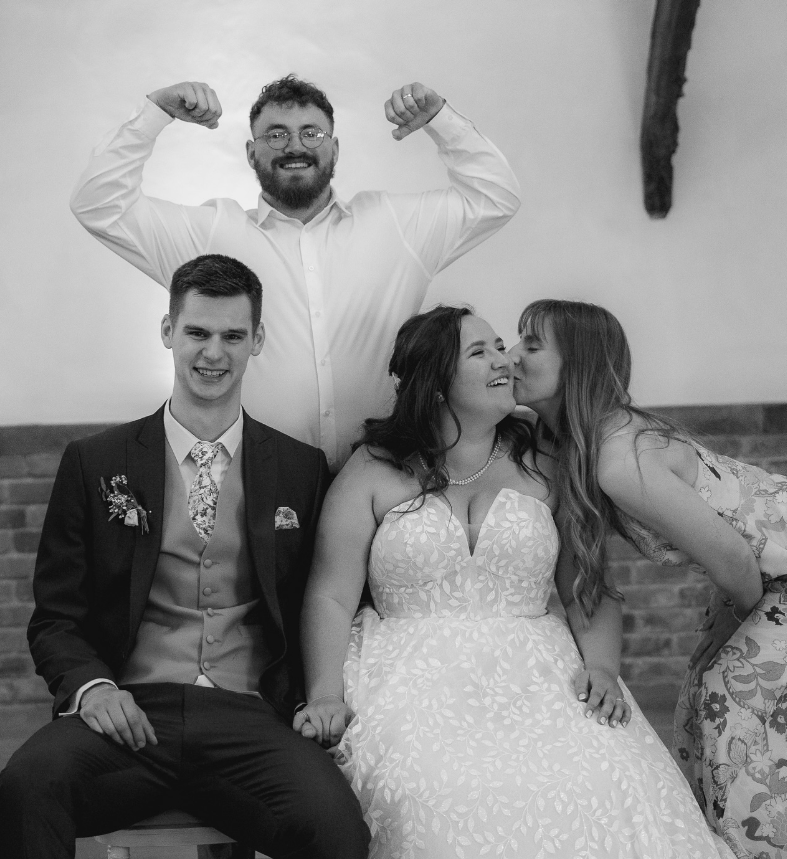 A bride and groom on their wedding day after working with a female personal trainer in Sandhurst